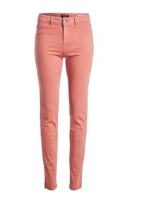 Vaqueros pitillo en tejido suave y elástico. Presentan un color rosa claro, diseño estándar de cinco bolsillos, trabillas para cinturón y cierre frontal con botón.