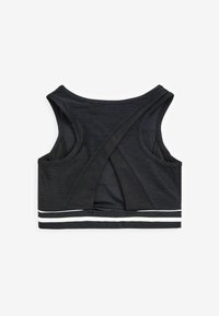 Next CROP - Top - black slogan