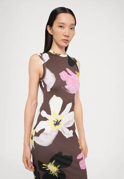 Fitted, sleeveless dress with a brown floral pattern featuring large white, pink, and yellow flowers. Smooth, stretchy fabric with a high neckline.