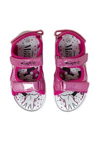 Sandali rosa con due cinturini regolabili, caratterizzati da una texture lucida e un design di Minnie Mouse sulla soletta con pois. Suola bianca.