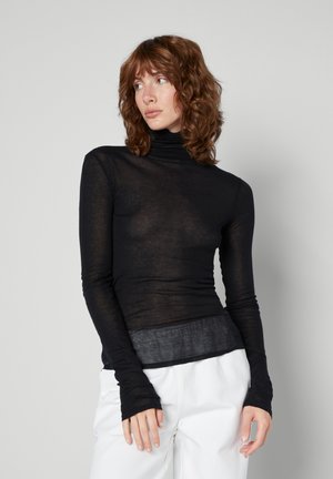 Schwarzes langärmliges Turtleneck-Oberteil aus transparenter Material. Enganliegender Schnitt mit verlängerten Ärmeln und einem leicht tiefer geschnittenen Saum auf Taillenhöhe.