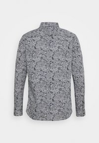 Pitkähihainen paita mustavalkoisella paisley-kuosilla. Klassinen kaulus ja napitus, valmistettu kevyestä, sileäpintaisesta kankaasta.