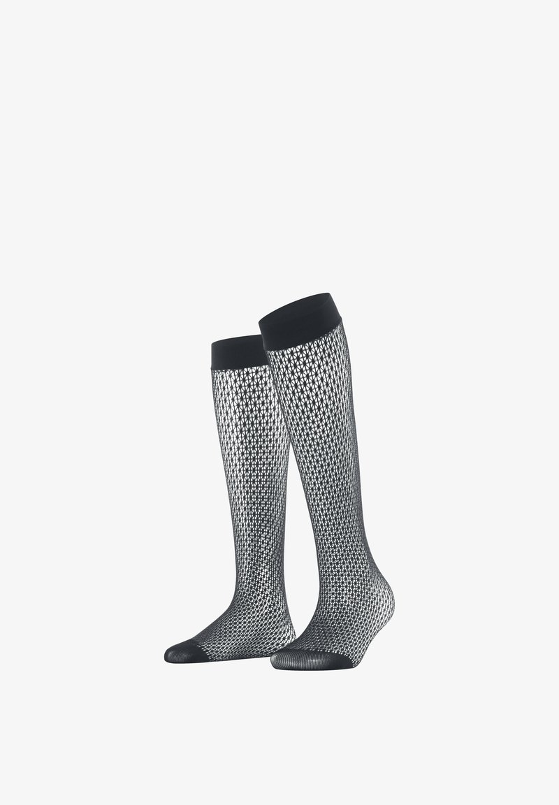 Schwarze kniehenke Socken mit einem geometrischen Netzmuster, ausgestattet mit einem soliden schwarzen oberen Rand und einem kontrastierenden einfarbigen Zehenbereich. Strukturierter Stoff.