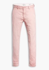 Smala rosa chinos i bomull. Har en klassisk midjeband, framfickor och en enfaldig knäppning för funktionalitet.