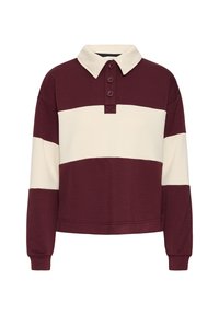 Pulóver a rayas en color marrón y crema con cuello tipo polo, tapeta de tres botones y mangas largas; textura suave y diseño corto.