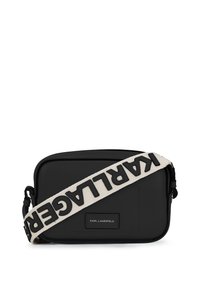 Black synthetic crossbody bag with a textured surface, featuring a bold, contrasting strap printed with "KARL LAGERFELD" and a rectangular logo patch.