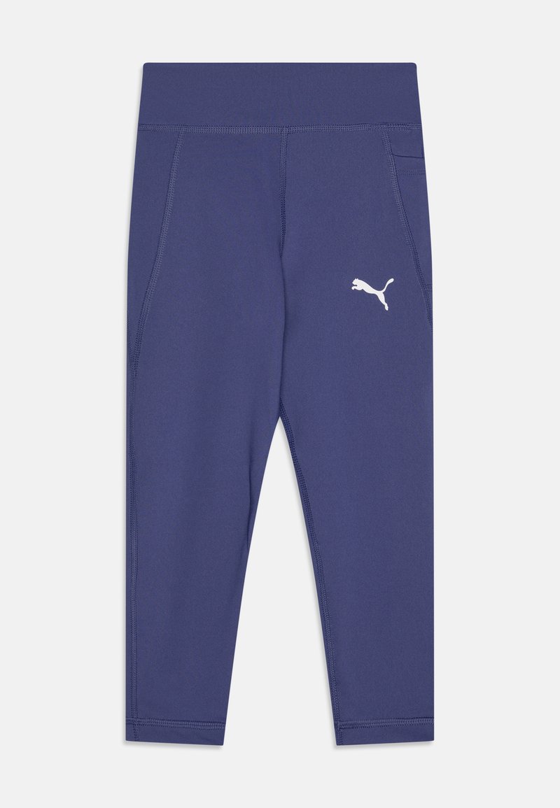Tengerészett kék aktív leggings, testhez álló kialakítással, rugalmas anyagból készült. A bal combon egy fehér Puma-logó található, valamint oldalsó zsebekkel rendelkezik.