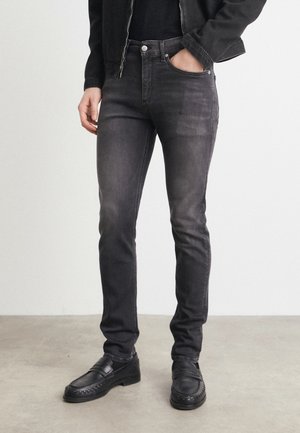 Skinny džíny - black denim