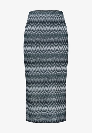 Falda lápiz de talle alto con patrón de zigzag chevrón en negro, gris y blanco y dobladillo a la altura de la rodilla.