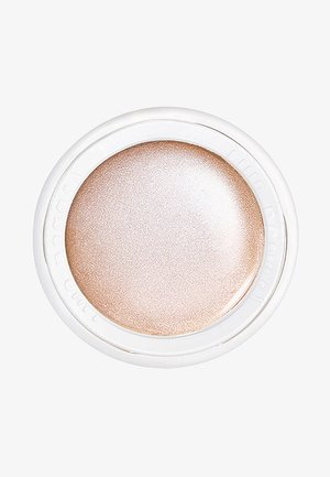 Cremiger Highlighter in einem runden weißen Kompakt, mit einem hellbeigen Farbton, schimmerndem Finish und glatter Textur.