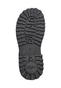 Suela de zapato de goma negra con un diseño de huella profundo y texturizado. Presenta el logotipo "Buffalo" grabado en el centro, indicando la talla 38.