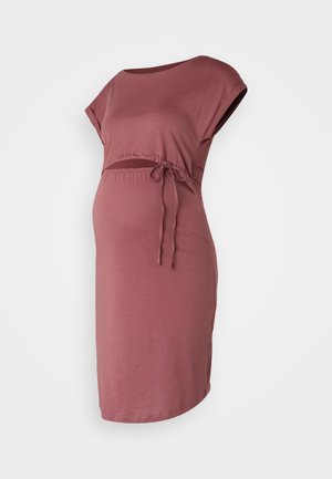 Raseduskleit pehmest ja venivast burgundia punasest kangast. Omab lühikesi varrukaid, ümarat dekolte ja reguleeritavat sidet kõhul.