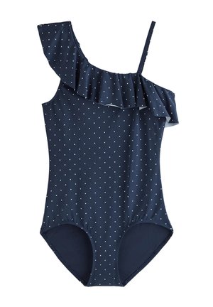 Mørkeblå badedragt med hvide prikker, én skulderrem med flæser og én tynd skulderrem.