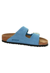 Blue suede sandal with a cork footbed and a black rubber sole. Features an adjustable strap with a silver buckle. Brand name printed on side.