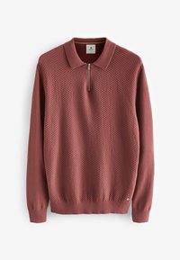 Pull en maille texturée à manches longues couleur rouille douce avec col à demi-fermeture éclair et poignets et ourlet côtelés.