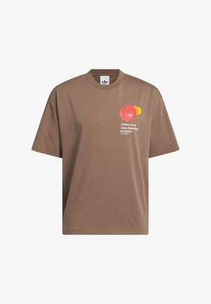 Brown cotton t-shirt with short sleeves, a crew neck, and a printed graphic featuring a basketball and text on the left chest area.