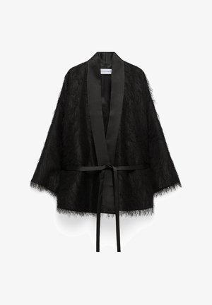 Black textured open-front kimono jacket with wide satin collar and attached waist tie belt, loose fit and three-quarter sleeves.
