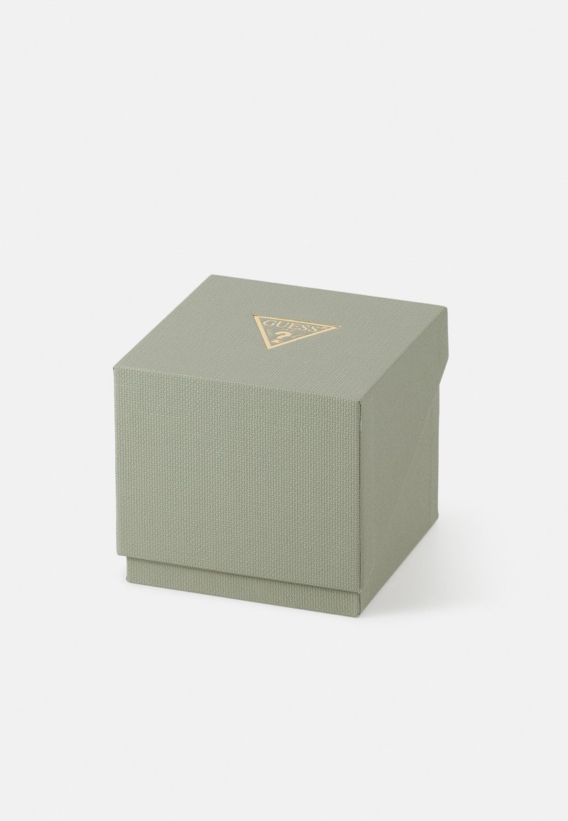 Boîte cadeau texturée verte avec un logo doré triangulaire à l'avant, dotée d'un couvercle et d'une forme cubique pour une fermeture sécurisée.