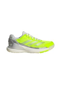 Neon yellow athletic shoe with gray accents, breathable mesh upper, and rubber sole. Features a streamlined shape and textured detailing.