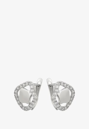 Orecchini d'argento con forme geometriche aperte irregolari contornate da piccole pietre preziose trasparenti, dotati di centri solidi e chiusure a clip.