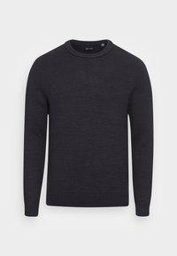 Pull bleu marine foncé en maille côtelée. Il présente un col rond et des manches longues avec des poignets et un ourlet côtelés. Design simple et uni.