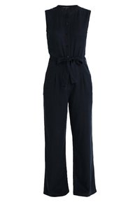 Navy modrý lněný overal s bezramenným designem, knoflíkovým zapínáním vpředu, opaskem na úpravu pasu a širokými nohavicemi. Obsahuje jemnou texturu a čisté linie.