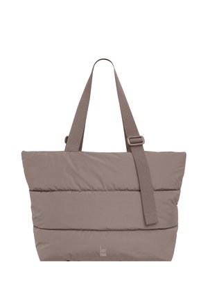 Sac fourre-tout matelassé taupe avec double poignée et bandoulière réglable, présentant des surpiqûres horizontales discrètes.