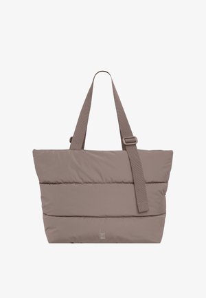 Taupe polstret tote taske med dobbelthåndtag og en justerbar skulderrem, med diskret vandret syning.