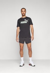 Puma ESS COL LOGO - Potiskana majica - black/fresh mint