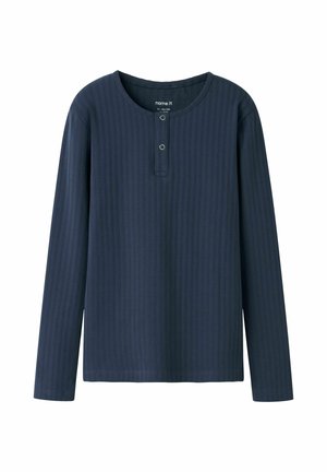 Chemise à manches longues côtelée bleu marine avec encolure ronde et deux petits boutons sur la patte de boutonnage avant.