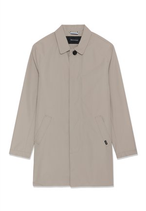 Trench-coat long beige avec col, un bouton noir visible, deux poches latérales et des boutons dissimulés à l'avant.