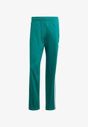 Teal sweatpants with a drawstring elastic waistband, side pockets, and white stripe accents along the outer legs. Made from a smooth fabric.