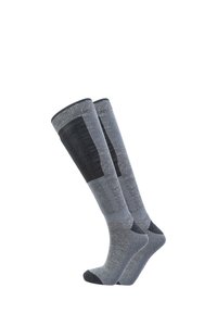 Knähöga strumpor i olika nyanser av grått med ribbad textur, förstärkta hälar och tåkappor. Tillverkade av ett mjukt, hållbart material.