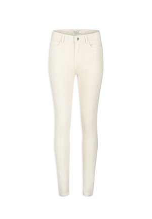 Skinny jeans in cream color, made from stretchy cotton blend fabric. Features classic five-pocket design and a button and zip fly closure.