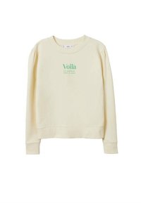 Sweatshirt couleur crème en tissu doux, doté d'un col rond, de manches longues et d'un texte imprimé vert indiquant "Voilà Le meilleur reste à venir."