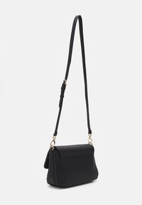 Black leather crossbody bag with a structured shape, fold-over flap, and adjustable strap. Features gold hardware accents and textured finish.