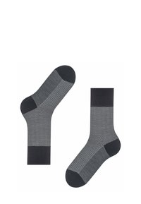 Calzini grigi scuri con motivo a spina di pesce, texture a maglia a coste, punta e polsini di un grigio scuro uniforme. Caratterizzati da una vestibilità comoda per l'uso quotidiano.