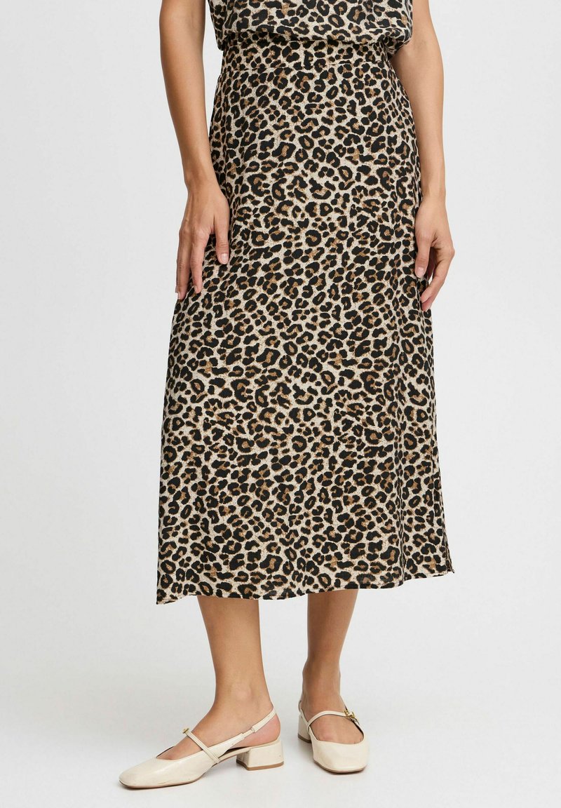 Leopardmönstrad midikjol i beige och svart, tillverkad av lättviktsmaterial, med en figurnära midja och siluett i rak design.