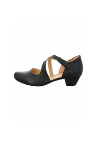 Scarpa in pelle nera con punta arrotondata, tacco basso e design a cinturino incrociato. Presenta una superficie liscia e dettagli laterali ritagliati per la traspirabilità.