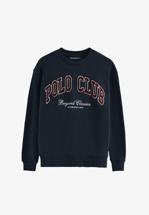 Marineblaues Sweatshirt mit Rundhalsausschnitt und langen Ärmeln. "POLO CLUB" in Burgunderrot mit weißen Akzenten und Stickerei auf der Vorderseite. Baumwollmischung.