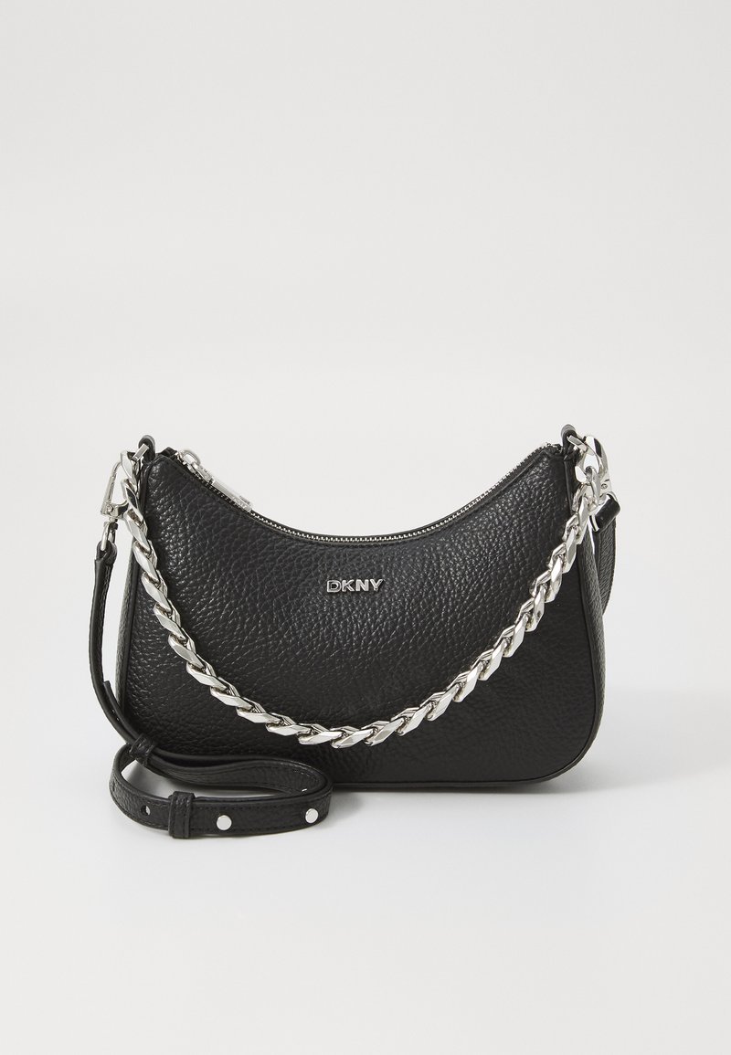 Black leather shoulder bag with a textured finish, silver chain accent, and adjustable strap. Features metal logo detail and zipper closure.