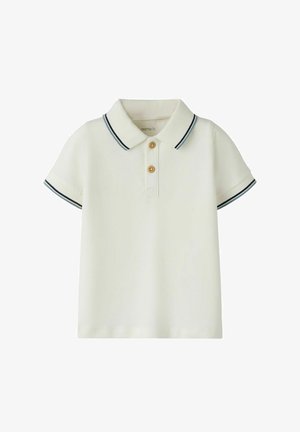 Short-sleeve white polo shirt with two wooden buttons and navy blue trim on collar and sleeves.