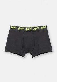 Boxeri negri dintr-un material moale, cu un design ajustat. Prezintă un brâu cu logo în verde neon și un buzunar conturat.