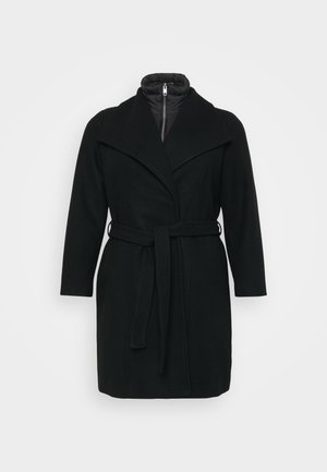 Black wool blend coat with a shawl collar, long sleeves, and a tie belt at the waist. Features a light quilted inner lining.