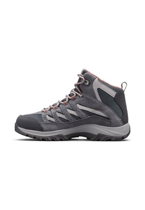 Graue Wanderschuhe mit einem mittelhohen Design, einer Mischung aus Wildleder und Netzmaterialien, mit roten Akzenten, Gummisohle und verstärkter Zehenkappe.