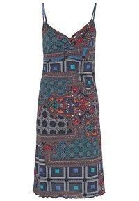 Robe sans manches avec fines bretelles et motifs géométriques et floraux mélangés dans des couleurs sarcelle, orange, rouge, bleu, blanc et noir.