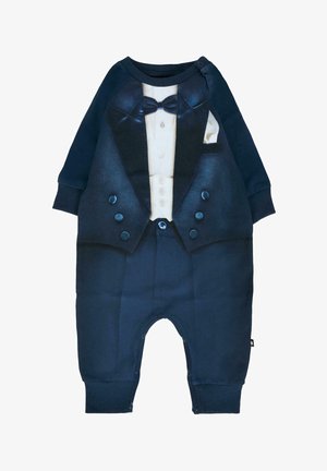 Bodysuit pour bébé en bleu marine avec un design de smoking imprimé, comprenant un nœud papillon, une veste, des boutons et un mouchoir de poche.