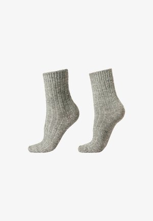 Grijze geribbelde sokken met een lengte tot halverwege het kalf, voorzien van een gestructureerd patroon en subtiele glitteraccenten door de stof.