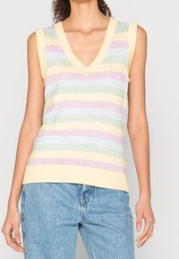 Top a righe senza maniche con scollatura a V, realizzato in tessuto leggero con strisce gialle, verdi, rosa e blu. Orlo a coste. Vestibilità casual.