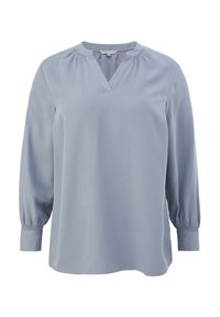 Himmelblaue Bluse mit langen Ärmeln und V-Ausschnitt, gerafften Schulternähten und elastischen Bündchen. Hergestellt aus einem glatten, weichen Stoff.